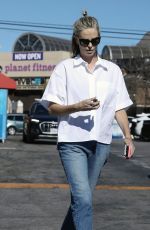 CHARLIZE THERON Out and About in Los Angeles 08/19/2024