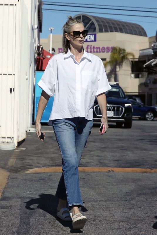 CHARLIZE THERON Out and About in Los Angeles 08/19/2024