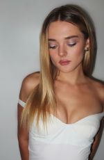CHARLOTTE LAWRENCE at a Photoshoot 08/11/2024