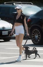 CHARLOTTE MCKINNEY Out with Her Dog in Los Angeles 07/28/2024