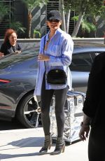 CHRISSY TEIGEN Out and About in Beverly Hills 08/28/2024