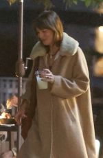 DAKOTA JOHNSON and Chris Martin Out in Malibu 08/16/2024