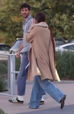 DAKOTA JOHNSON and Chris Martin Out in Malibu 08/16/2024
