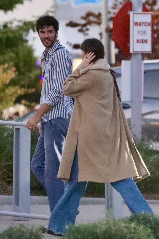 DAKOTA JOHNSON and Chris Martin Out in Malibu 08/16/2024