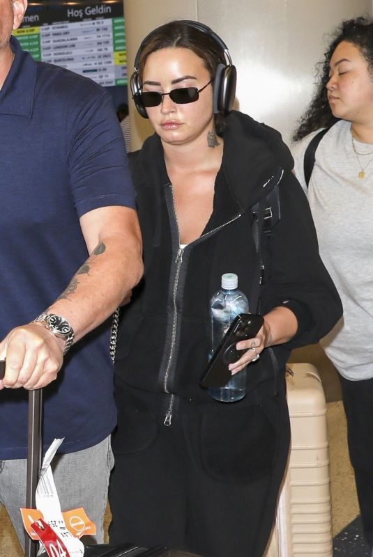 DEMI LOVATO Arrives at Los Angeles Airport 08/25/2024