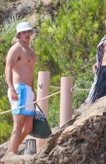 DUA LIPA in Bikini at a Beach 08/06/2024