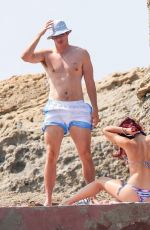 DUA LIPA in Bikini at a Beach 08/06/2024