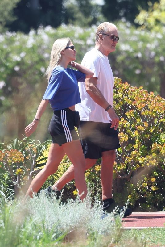 EMMA KROKDAL and Dolph Lundgren Out for a Walk in Beverly Hills 08/20/2024