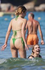 EMMA ROBERTS and ASHLEY BENSON in Swimsuits at a Beach in Saint Tropez 07/26/2024