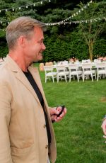 EMMA ROBERTS at Genesis House x Marc Hom: Re-Framed Hamptons Dinner at Water Mill 08/16/2024