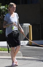 ERIKA ELENIAK Out with Her Dog in Los Angeles 08/07/2024