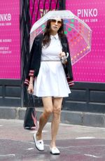 FAMKE JANSSEN Out Under an Ambrella in New York 08/07/2024