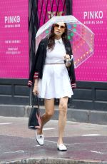 FAMKE JANSSEN Out Under an Ambrella in New York 08/07/2024