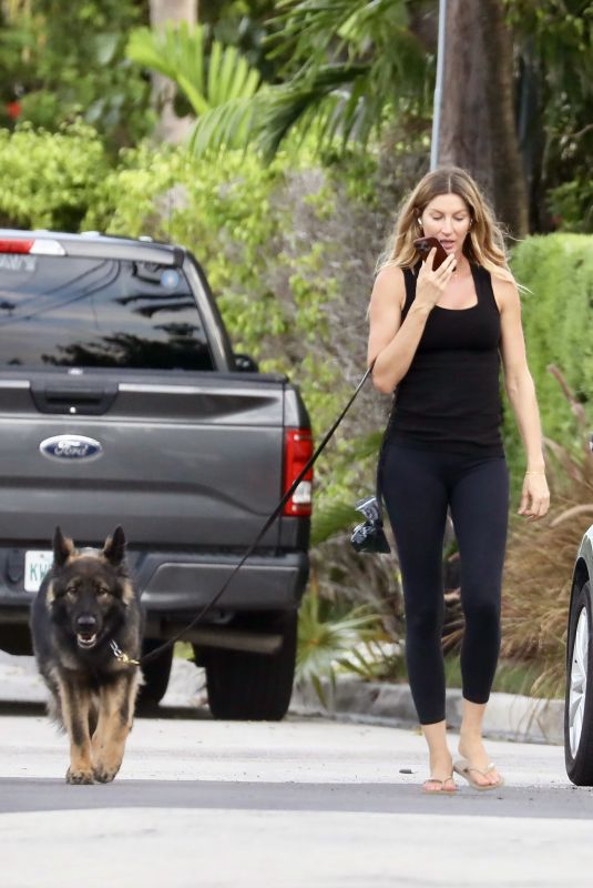 GISELE BUNDCHEN Out Walking Her Dog in Miami Beach 08/21/2024