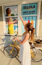 JENNIFER LOPEZ Stocking Up on Her Delola Cocktails at a Hamptons Liquor Store 07/31/2024