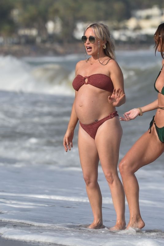 JENNIFER METCALFE and Pregnant JORGIE PORTER in Bikinis at a Beach in Spain 08/13/2024