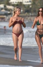 JENNIFER METCALFE and Pregnant JORGIE PORTER in Bikinis at a Beach in Spain 08/13/2024