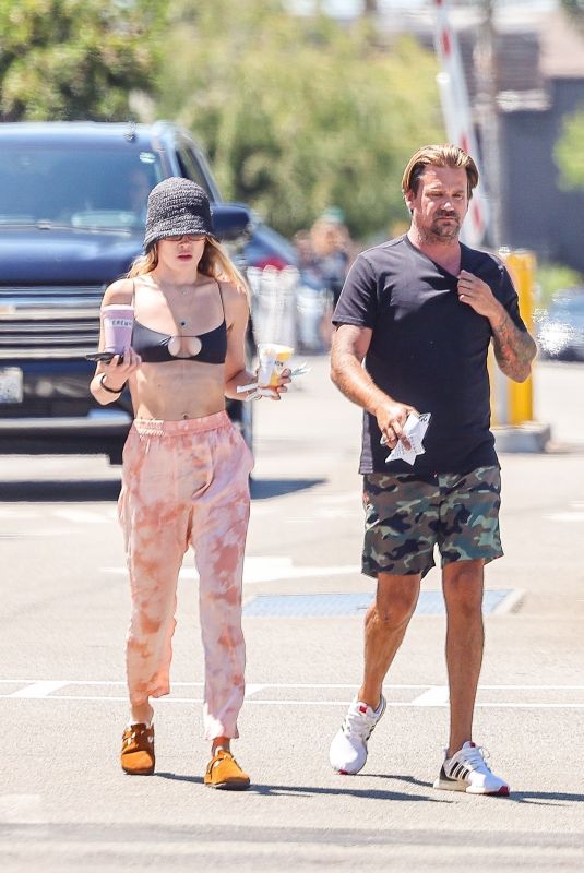 JULIA STAMBLER and Sean Stewart Cruising in His Convertible Ferrari in Los Angeles 08/12/2024