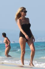 KATE and LILA GRACE MOSS in Bikinis at a Beach In Ibiza 08/07/2024