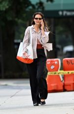 KATIE HOLMES Talking on Her Phone Out in Brooklyn 08/26/2024