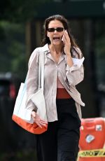 KATIE HOLMES Talking on Her Phone Out in Brooklyn 08/26/2024