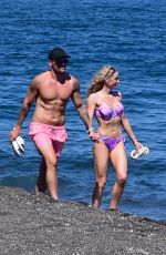 KATIE MCGLYNN in Bikini on the Beach in Santorini 07/15/2024