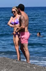 KATIE MCGLYNN in Bikini on the Beach in Santorini 07/15/2024