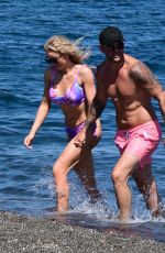 KATIE MCGLYNN in Bikini on the Beach in Santorini 07/15/2024