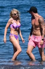 KATIE MCGLYNN in Bikini on the Beach in Santorini 07/15/2024
