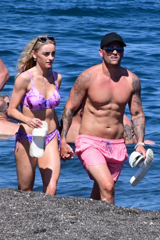 KATIE MCGLYNN in Bikini on the Beach in Santorini 07/15/2024