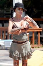 KATIE PRICE in a Louis Vuitton Bikini Showing Her Geavily Bandaged Bruised Face Out in Turkey 08/04/2024
