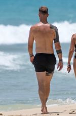 KIMBERLY CREW in Bikini and Joe Hart at a Beach in Barbados 08/14/2024