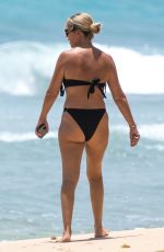 KIMBERLY CREW in Bikini and Joe Hart at a Beach in Barbados 08/14/2024