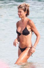 LAURA RAVETTO in Bikini at Club 55 in Saint Tropez 08/18/2024
