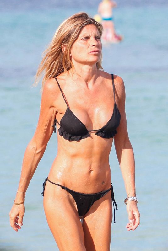LAURA RAVETTO in Bikini at Club 55 in Saint Tropez 08/18/2024