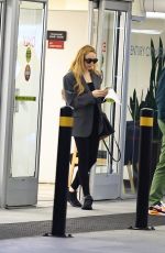 LINDSAY LOHAN Out with Her Husband in Beverly Hills 07/31/2024