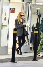 LINDSAY LOHAN Out with Her Husband in Beverly Hills 07/31/2024