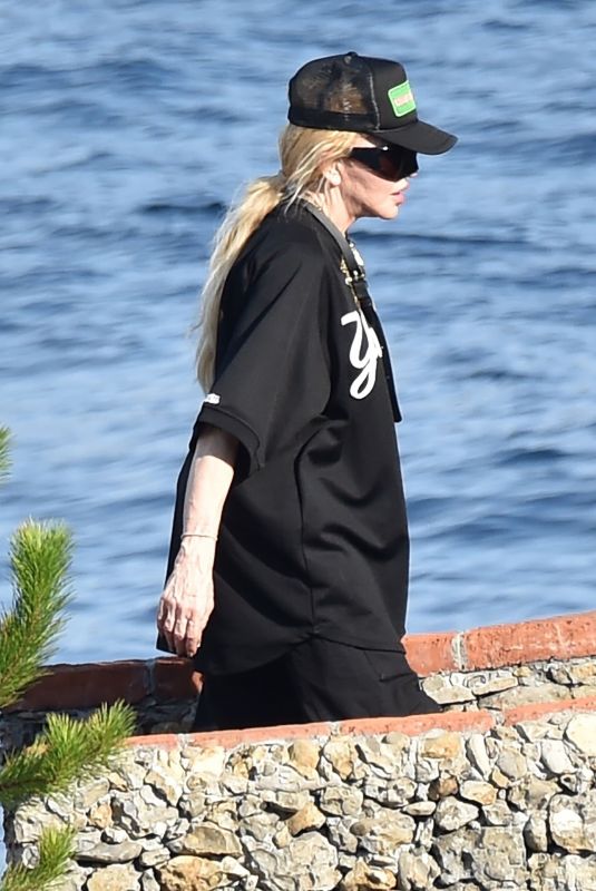 MADONNA Arrives at Dolce and Gabbana