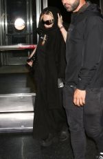 MADONNA with Her Rumored New Boyfriend at JFK Airport in New Yotk 08/09/2024