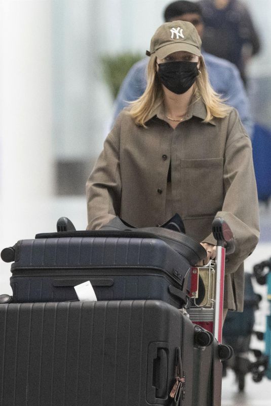 MARGOT ROBBIE Arrives at Airport in Toronto 08/06/2024