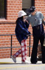 MEGAN FOX and Machine Gun Kelly Out Shopping in Beverly Hills 08/29/2024