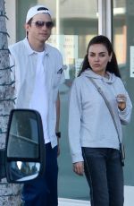 MILA KUNIS and Ashton Kutcher Out for Dinner at Matu Restaurant in Beverly Hills 08/17/2024