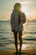 MOMONA TAMADA at a Photoshoot, August 2024