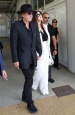 MONICA BELLUCCI and Tim Burton Arrives at Marco Polo Airport in Venice 08/27/2024