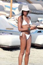 NAOMI CAMPBELL in Bikini at a Beach in Mykonos 08/23/2024