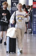 OLIVIA DUNNE Arrives at LAX Airport 08/12/2024