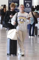 OLIVIA DUNNE Arrives at LAX Airport 08/12/2024
