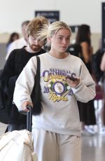OLIVIA DUNNE Arrives at LAX Airport 08/12/2024