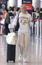 OLIVIA DUNNE Arrives at LAX Airport 08/12/2024