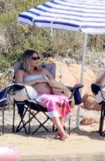Pregnant MARGOT ROBBIE in Bikini and Tom Ackerley at Summer Holiday in Sardinia 08/28/2024